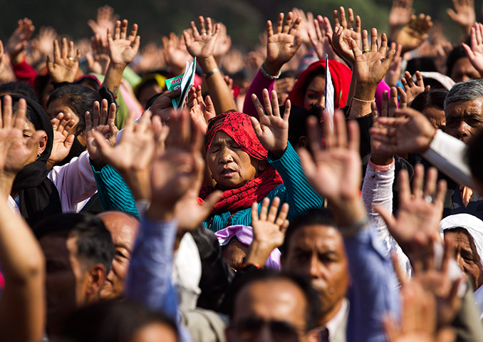 Easter Sunday: A group of Nepalese Christian pray at a religious gathering