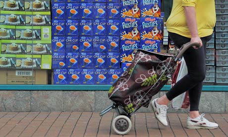 woman pulls her shopping basket