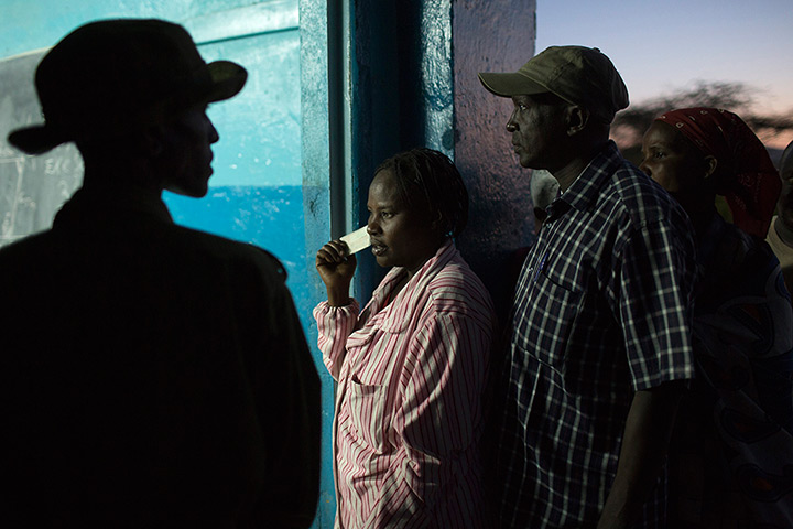 kenya elections: People wait to cast their votes at a school in Archers Post, Isiolo County