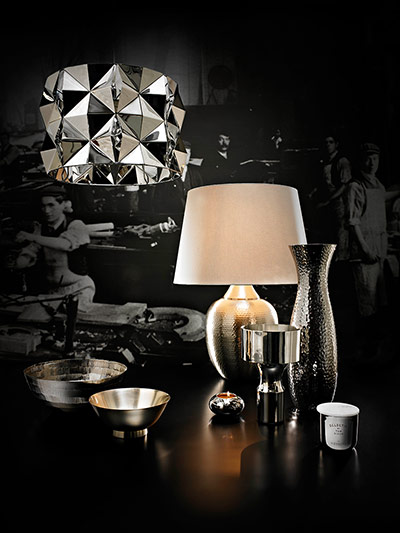homes - metals: silver items and accessories against dark background