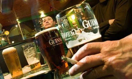 Drinking and smoking in a pub