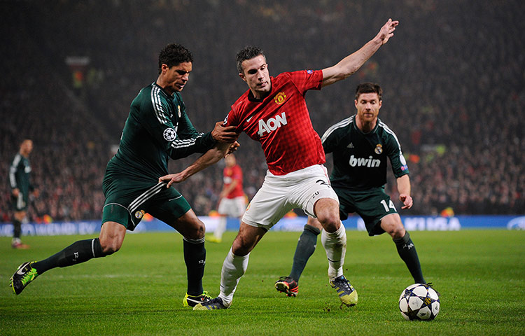 Man Utd v Real Madrid: Varane and Van Persie tussle