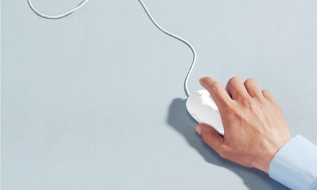 digital marketing - man moving a computer mouse