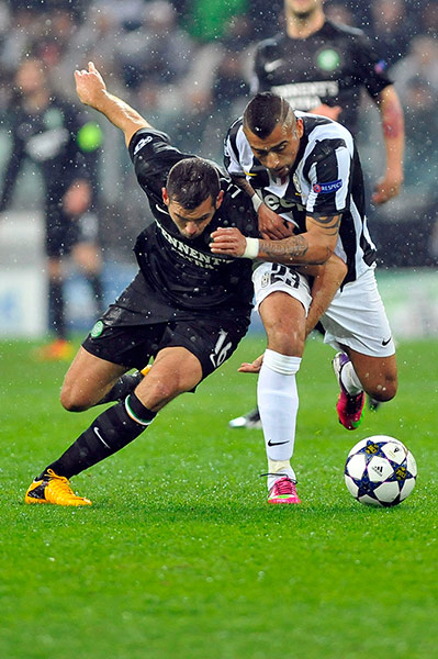 Wed champions league: Juventus' Vidal and Celtic's Joe Ledley go shoulder to shoulder