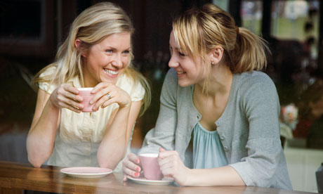 Two women having a cup of coffee in a cafe Sweden.