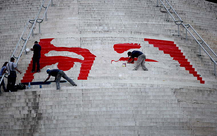 24 hours in pictures: Mural of the eyes of Venezuela's late President Hugo Chavez