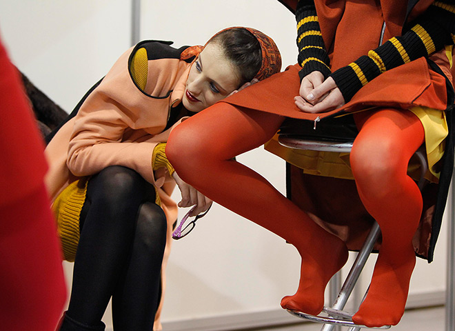 24 hours in pictures: Models wait backstage during Ukrainian Fashion Week