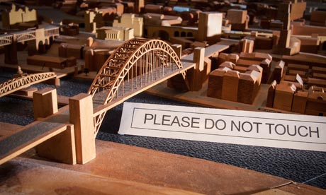 A model of Newcastle with a 'please do not touch' sign