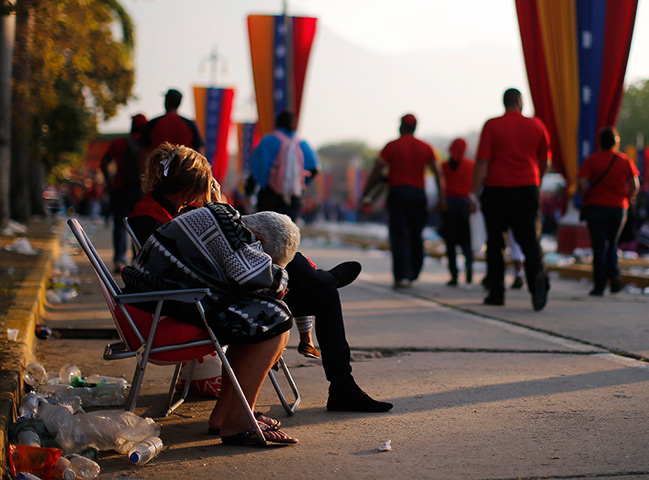 Hugo Chavez funeral: People rest after having spent the entire night to view his body in state