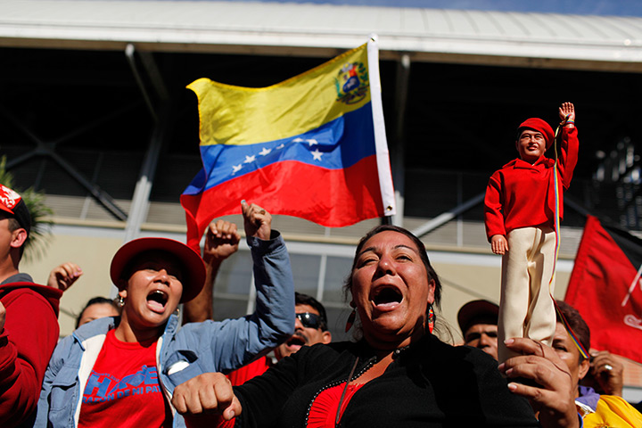 Hugo Chavez funeral: Supporters shout slogans as they line up