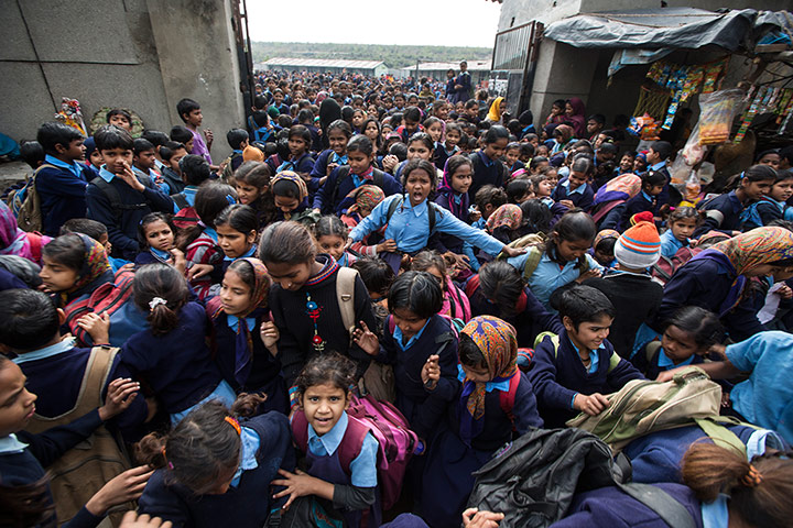 India education gallery: Girls leave the school morning session