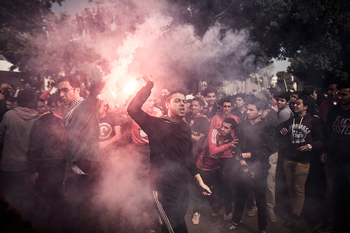 Supporters of the Cairo-based al-Ahly football club react to the verdict.