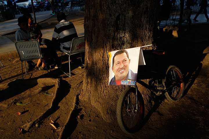 24 hours: A poster with an image of Venezuela's late President Hugo Chavez