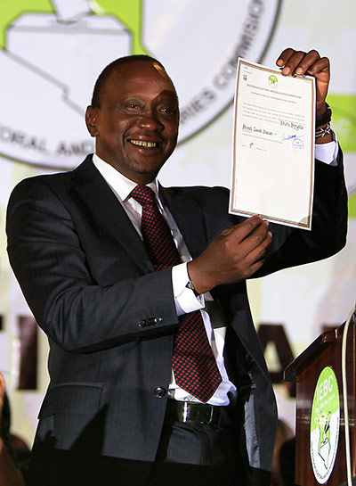 Kenya update: President elect Uhuru Kenyatta displays his certificate