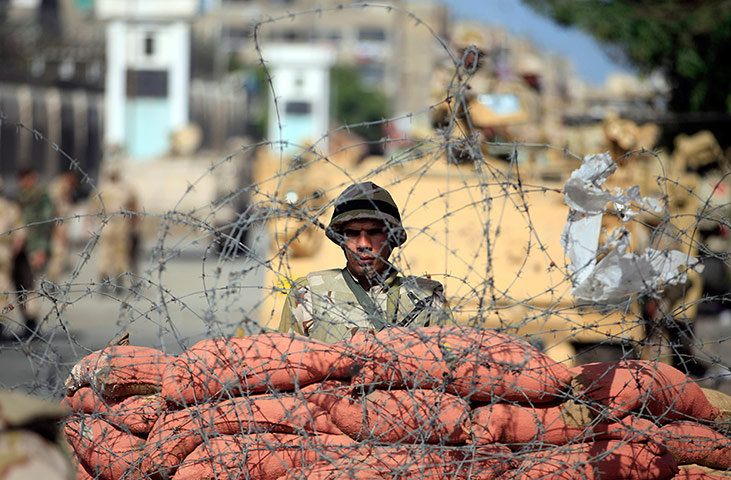 Port Said: An Egyptian soldier stands guard outside the prison in Port Said