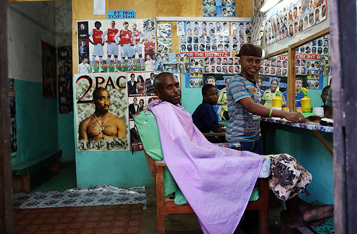 24 hours: Lamu town, Lamu: A customer sits in a barber shop