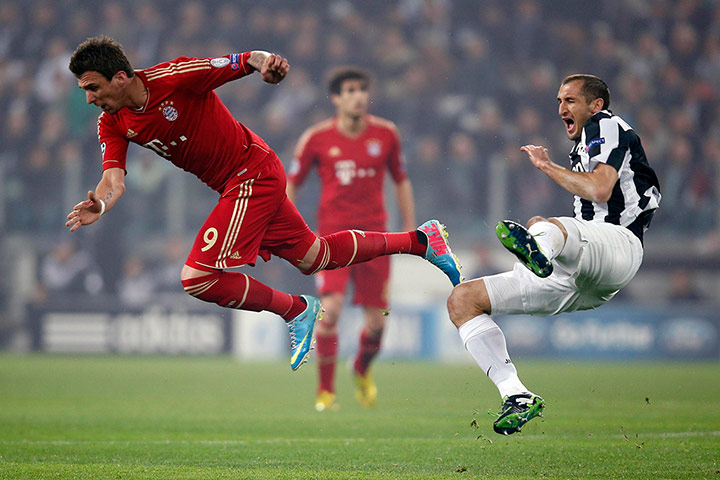 Wednesday Champ League: Bayern Munich's Mandzukic and Chiellini of Juventus
