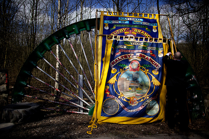 maltby colliery closes: Banners lean against a disused pit wheel