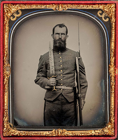 Civil war photography: 48. Confederate Sergeant, Standing, with Large Bowie Knife.jpg