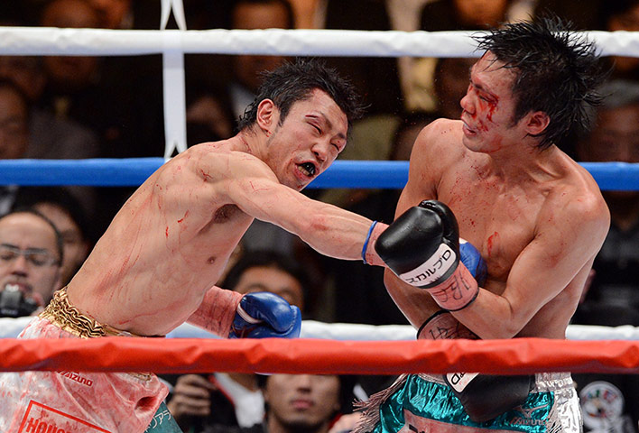 best of the week: Challenger Akira Yaegashi, left, lands a right on Toshiyuki Igarashi