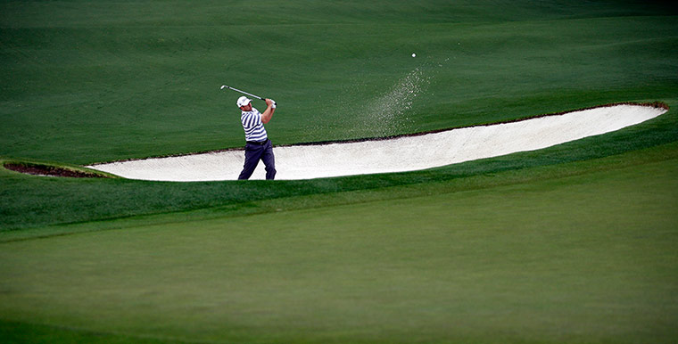 Augusta day 2: Ben Curtis chips out of a bunker