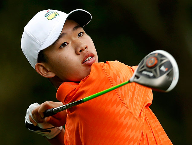 Augusta day 2: Amateur Guan Tianlang of China hits his tee shot