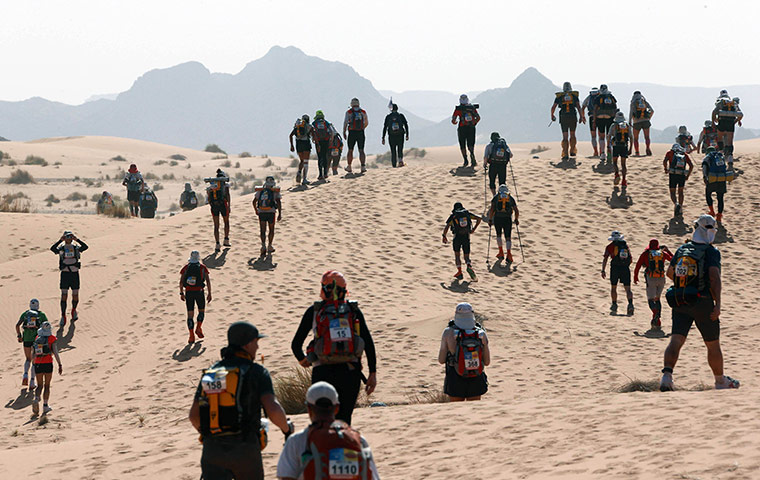 24 Hours: Competitors climb dunes during the 28th Marathon des Sables
