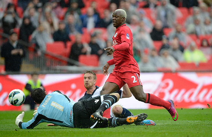 FA Cup semi: Arouna Kone has a shot saved by Millwall David keeper Forde