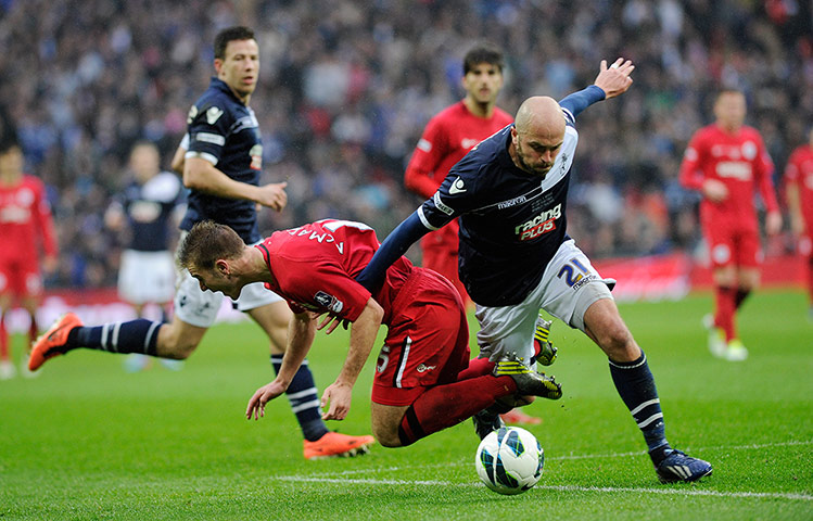 FA Cup semi: Wigan player Callum McManaman is fouled by Jack Smith of Millwall 