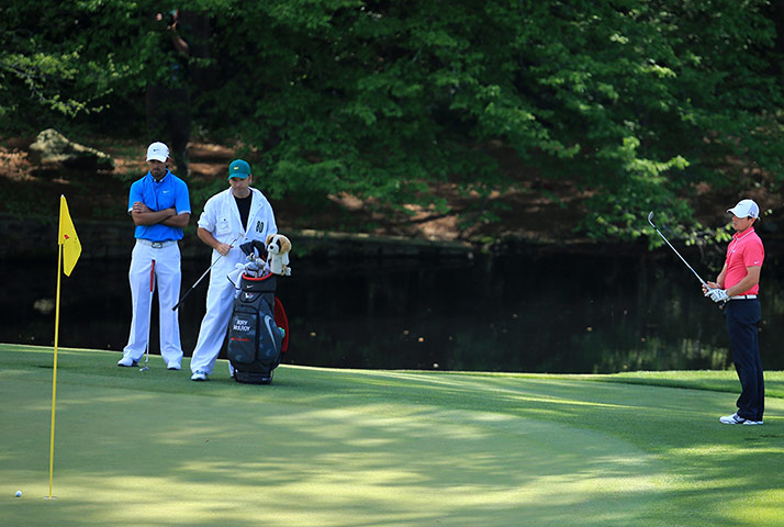 golf day 3: Rory McIlroy reacts to his fifth shot on the 11th