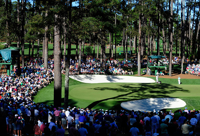 golf day 3: Patrons watch the action on the 16th green 