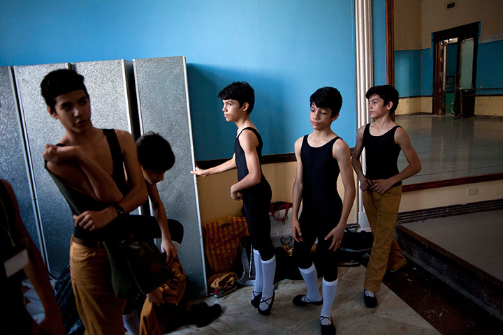 24 hours: Havana, Cuba: Identical Castellanos triplets prepare for ballet class