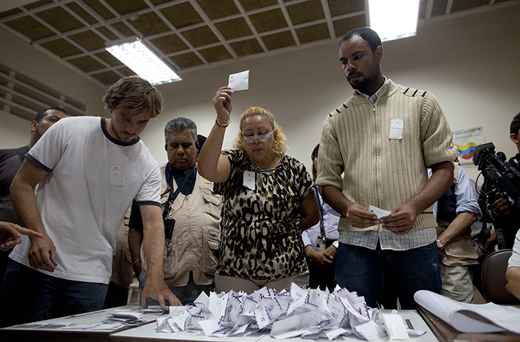 Venezuela results: Polling station delegates start the counting of votes in Caracas, Venezuela