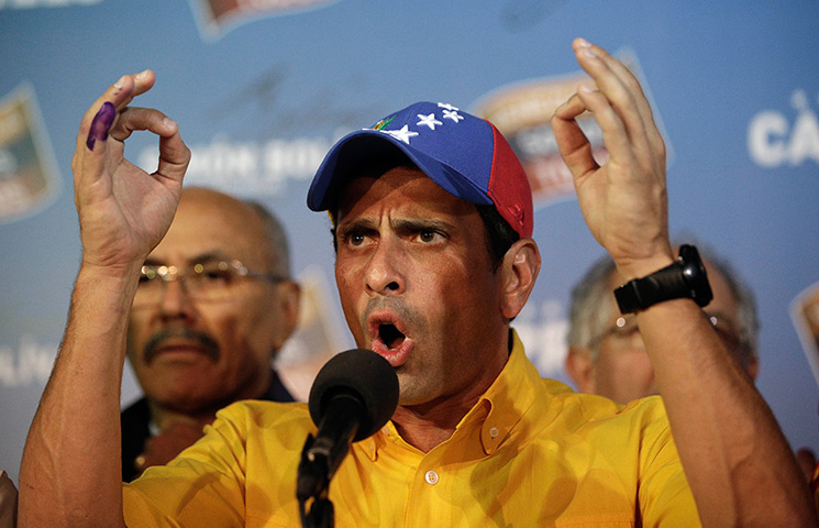 Venezuela results: Opposition presidential candidate Henrique Capriles talks to journalists