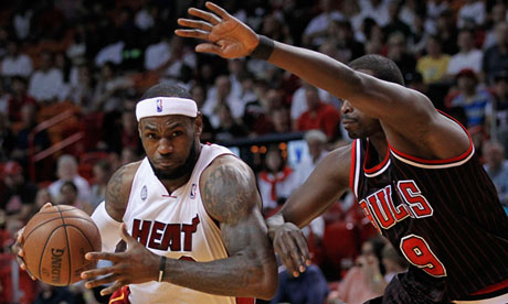 Miami Heat Game on Miami Heat S James Drives Against Chicago Bulls  Deng In First Half