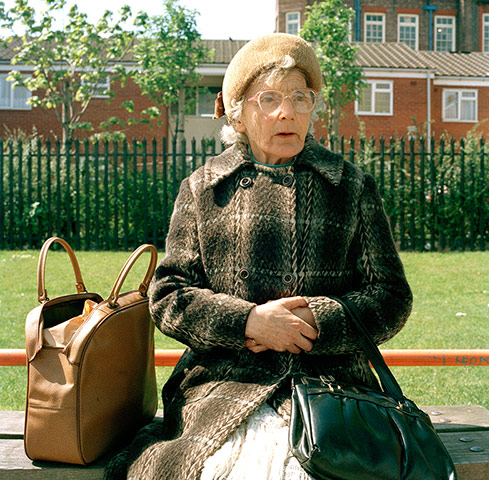 Big Picture - Rob Bremner: elderly woman sitting in park with handbag next to her