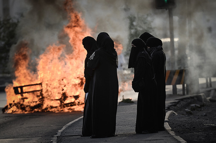 24 hours in pictures: Jidhafs, Bahrain: Bahraini women during a rally in support of political act