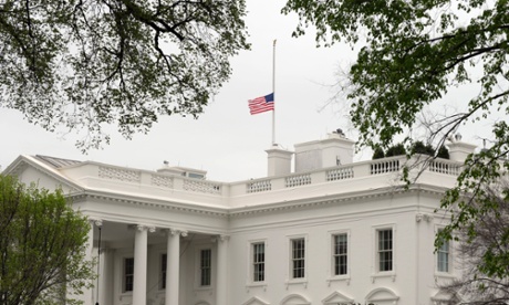 The American flag is lowered at the White House to mark those who died in the Boston Marathon bombings.