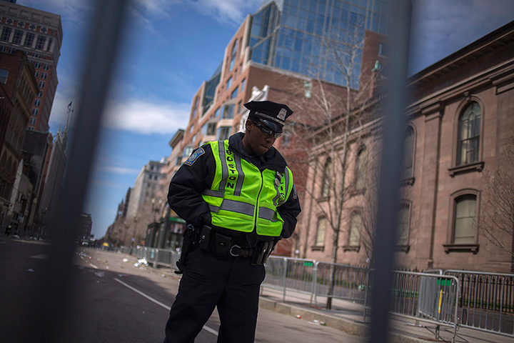 24 hours: Boston, Massachusetts, USA: A police officer stands guard