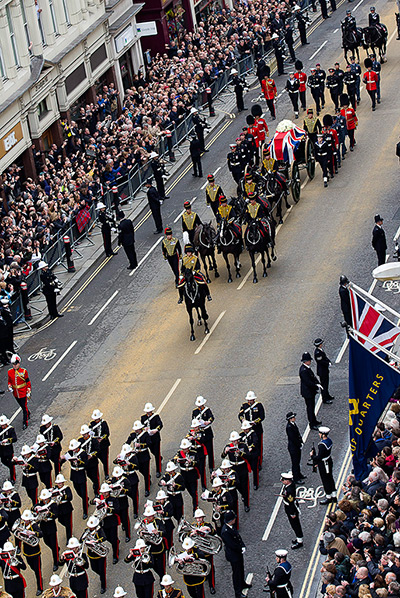 Churchill comparison: A gun carriage bears the coffin of Margaret Thatcher up Ludgate Hill