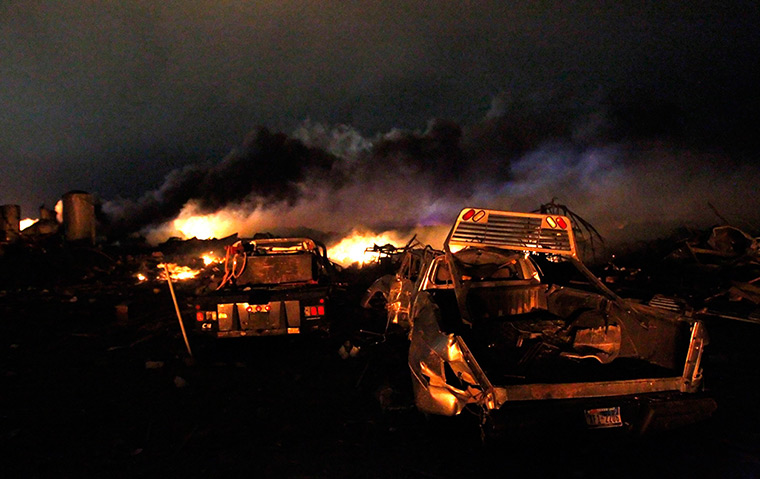 Texas explosion: Vehicles are seen near the remains of the plant 