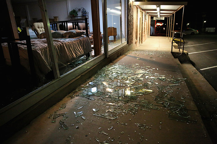 Texas explosion: Glass windows lay shattered on the pavement