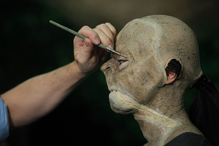 24 hours: Beijing, China: A girl gets make-up from Weta Workshop 