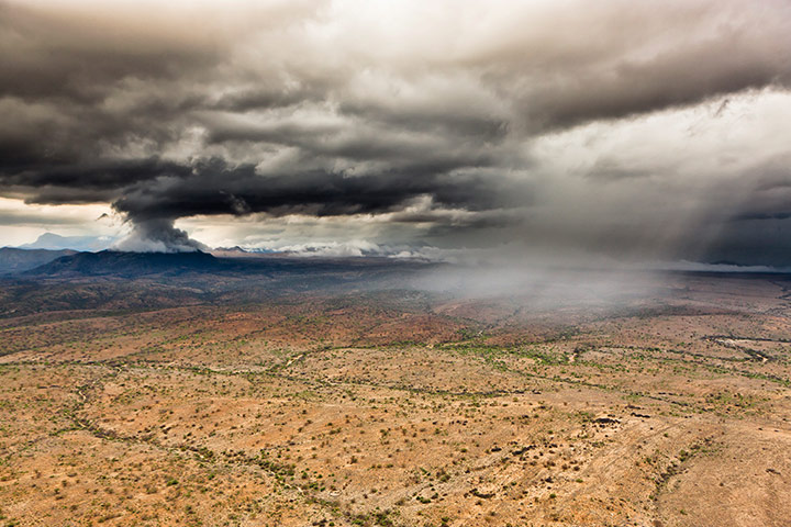 rift valley from above: Thunderstorms approaching near Desert Rose, Northern Kenya