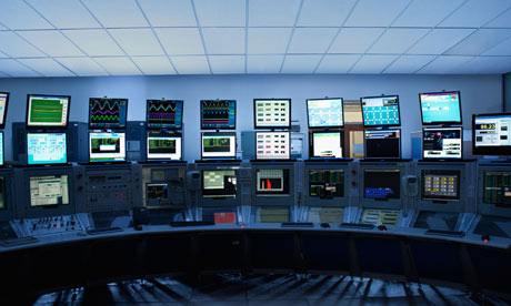 Computer screens in control room