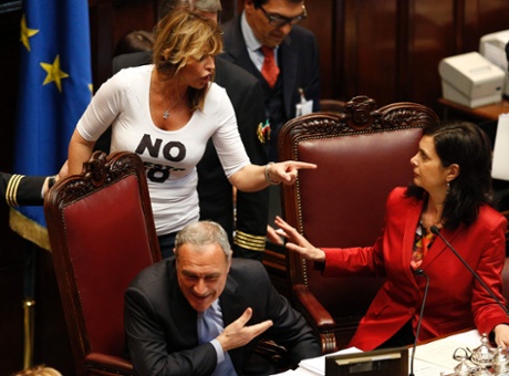 PDL (People of Freedom party) member Alessandra Mussolini (L) gestures with Lower house president Laura Boldrini during the second day of the presidential election in the lower house of the parliament in Rome April 19, 2013. I