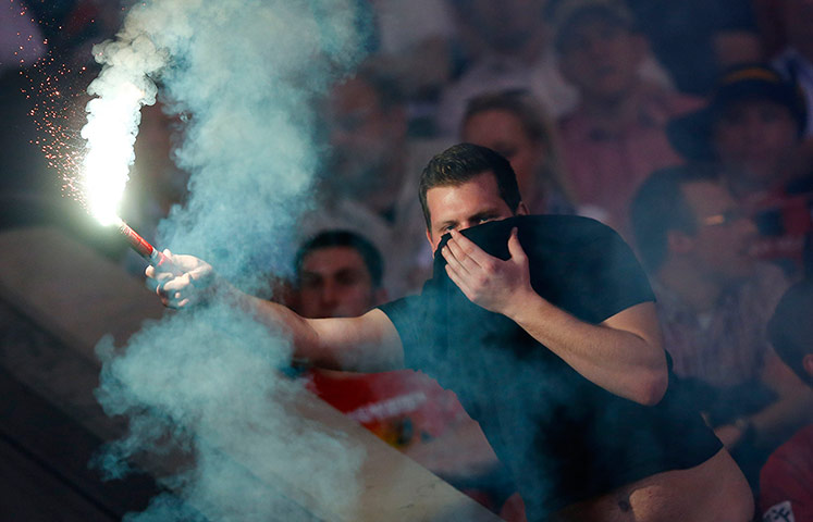 Best of sport 19/04/2013: A supporter of SC Freiburg lights a flare
