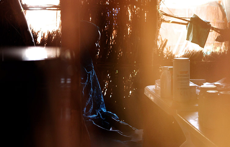20 Photos: A refugee woman waits for medication at a treatment centre in South Sudan
