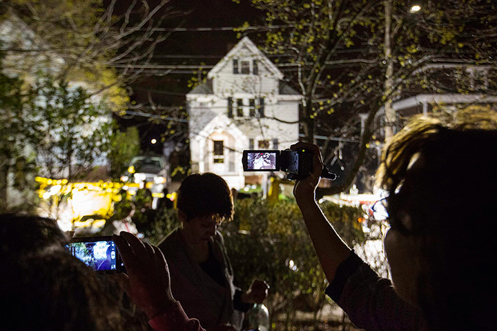 24 Hours: People use cameras to record the boat where Dzhokhar Tsarnaev was hiding