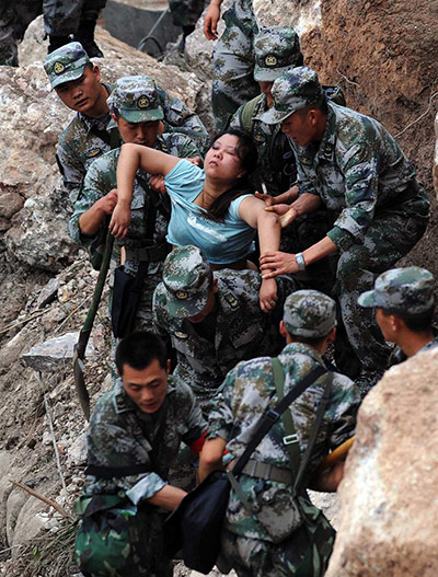 China: Rescuers save an injured woman in Baosheng township